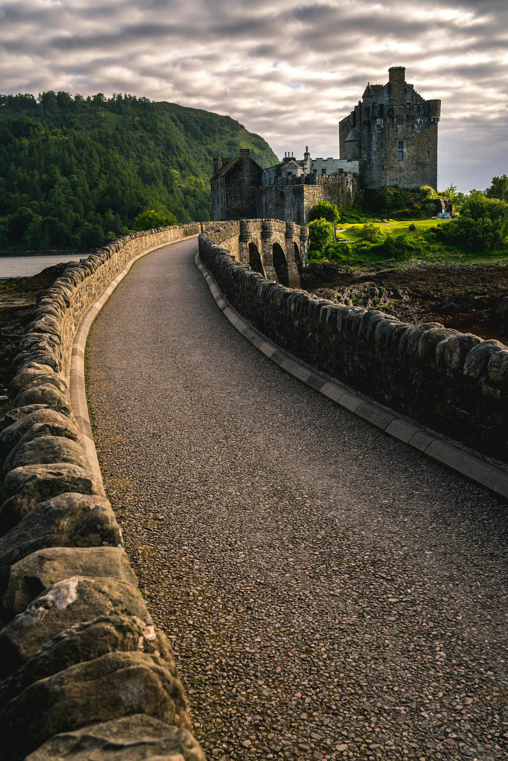 stone bridge with castle in background